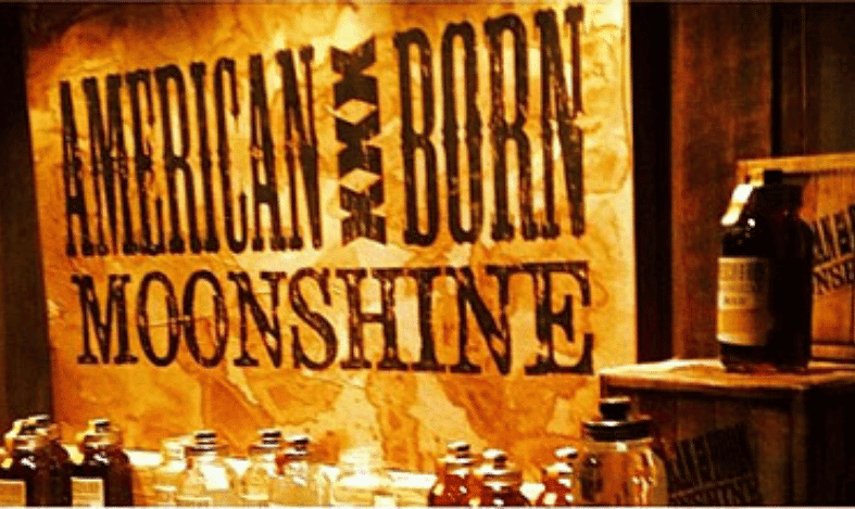 american born moonshine yellow sign