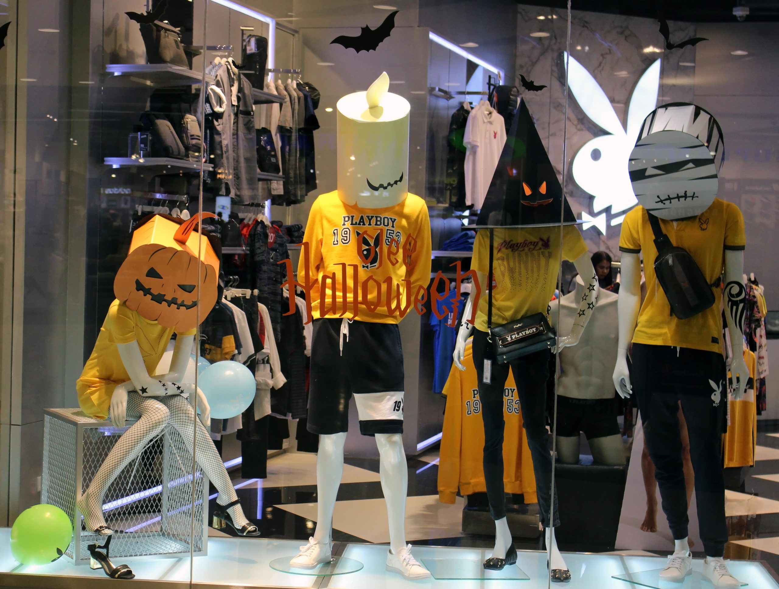 store window halloween clothing and mannequins