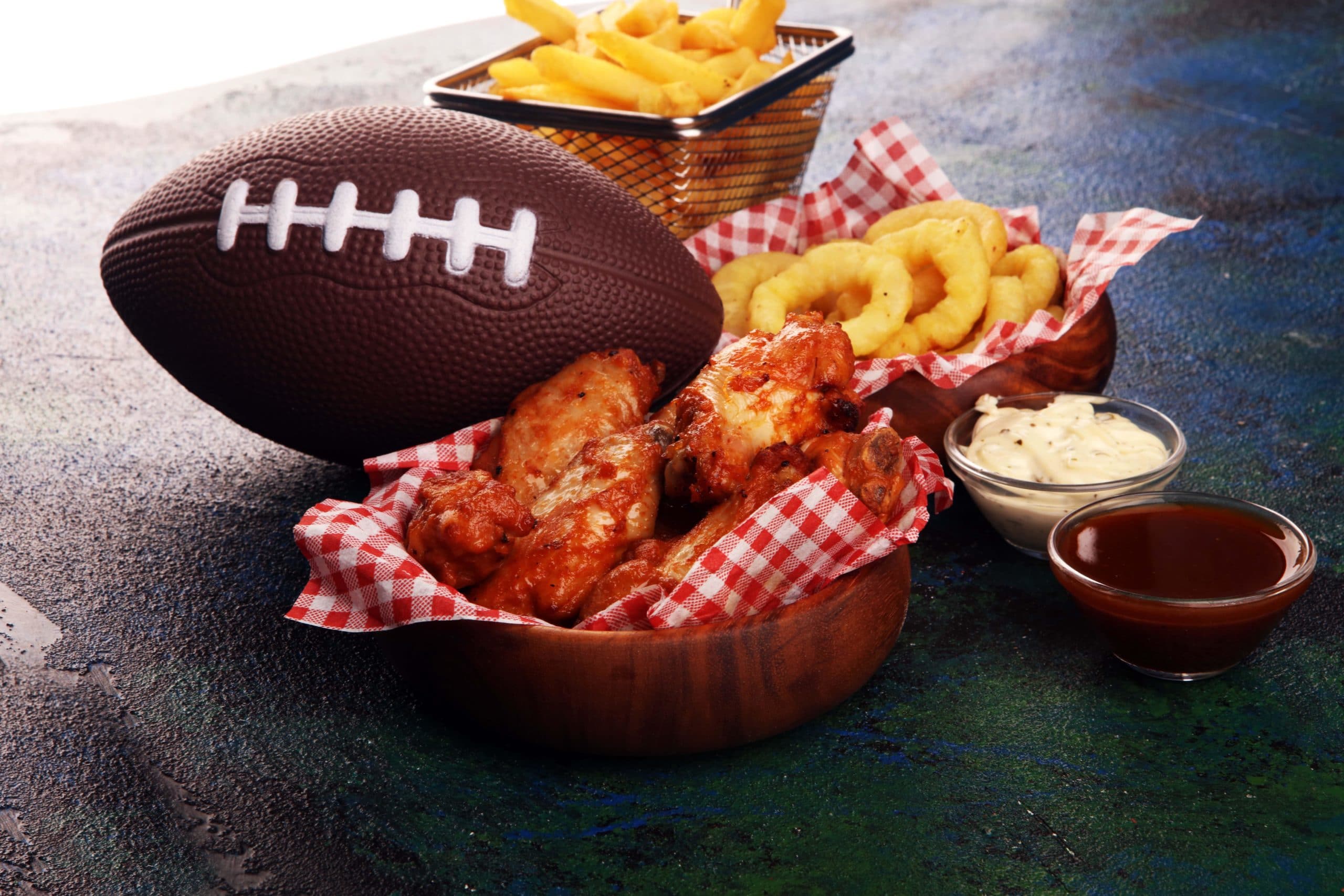 wings and pizza fast food with a football