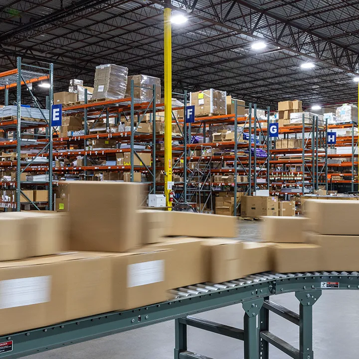 Woman scanning barcodes in a warehouse